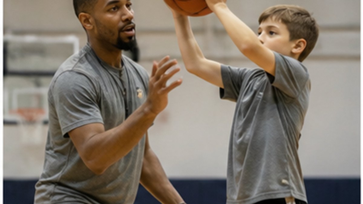 Youth basketball player at the free-throw line demonstrating a balanced shooting stance and follow-through