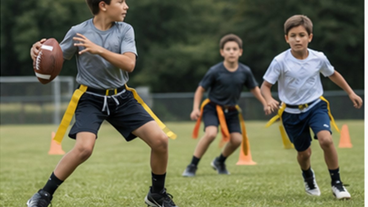 Youth football receiver breaking on a route at a cone marking the correct depth