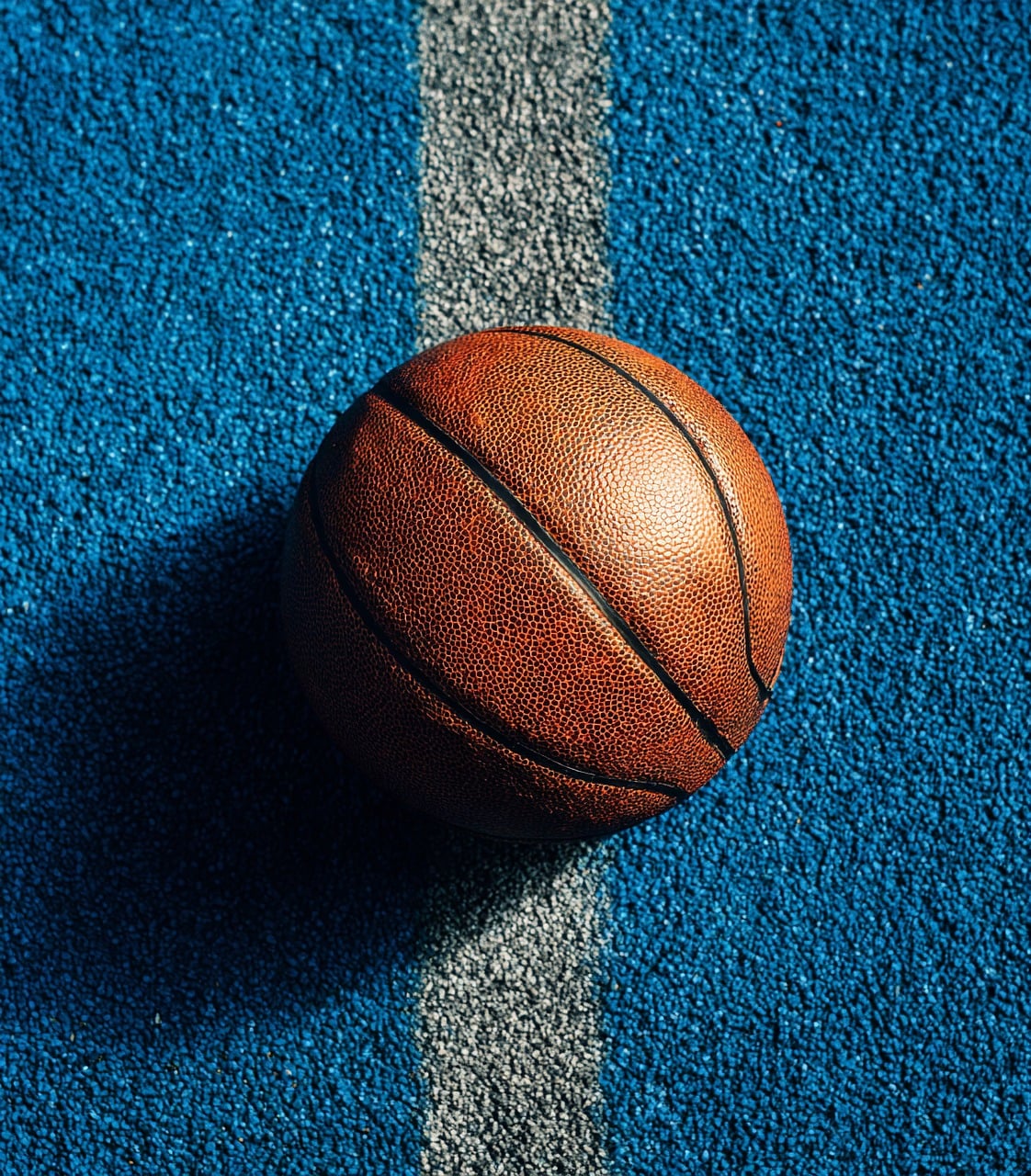 Outdoor basketball court used for a player learning session