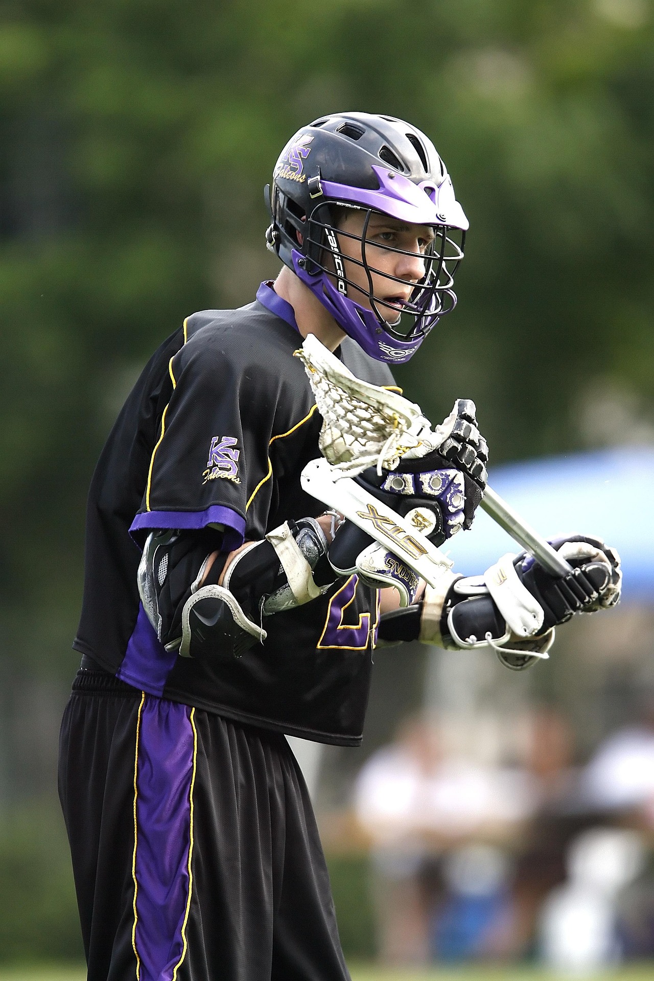 Youth lacrosse players developing skills during a coached practice